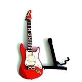 El paquete incluye: 1 decoración de guitarra, 1 soporte de guitarra, 1 caja negra de piel
