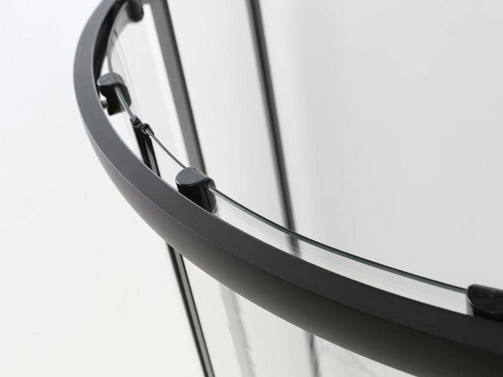 Close-up of the top rail and roller mechanism of the shower door