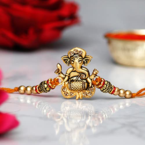 Image of eCraftIndia Set of 7 Rakhi Combo Hamper | Multicolor Om Ganesha Swastik Rudraksha Pearls Religious Designer Rakhis | Roli Chawal Pack