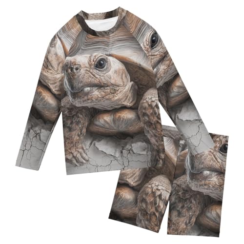 Conjunto de protección UV para niños que evita quemaduras solares con bañador de manga larga