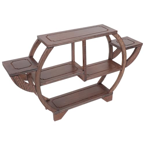 Objets de collection bien rangés grâce au présentoir bois à curiosités