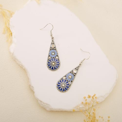 Boucles d'oreilles en forme de fleur bleue pour sublimer un visage - 3