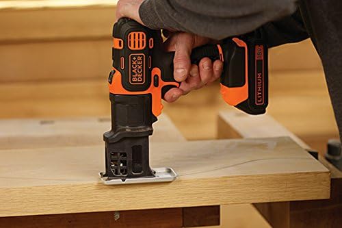 Person using the jigsaw attachment