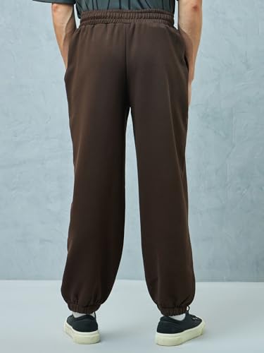 Image of Bewakoof Men's Solid Super Loose Fit Cotton Blend Joggers