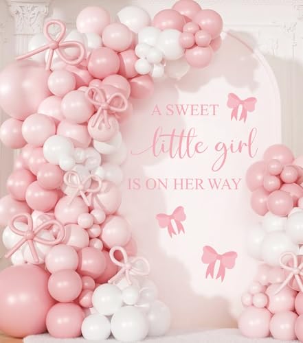 Décoration de fête prénatale avec arche de ballons pour fond photo de buffet