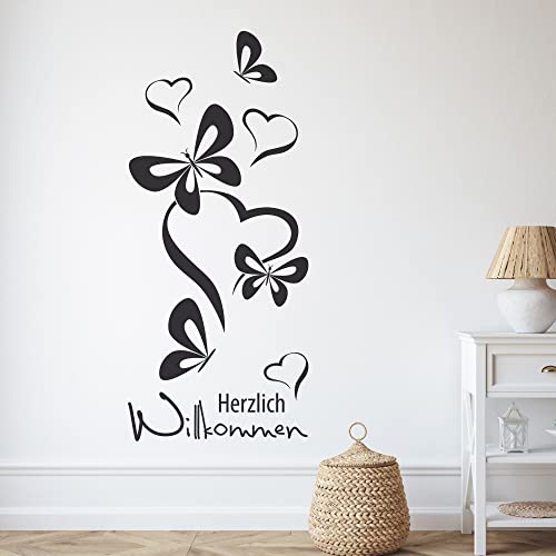 GRAZDesign Wandtattoo Flur Herzlich Willkommen Spruch, Schmetterlinge für Eingang, Wand Deko selbstklebende Klebefolie, Wohnzimmer, 68x30cm, 070 schwarz