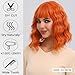 andromeda Orange Wavy Wig with Bangs Soft Short Bob Wigs for Women Synthetic Shoulder Length Women's Wig for Halloween Costumes Cosplay Daily (Orange)