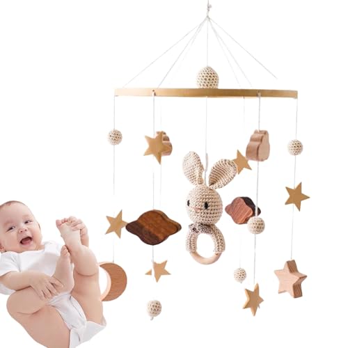 Mobile de berceau en bois et étoiles suspendues pour apaiser le sommeil de bébé avec élégance