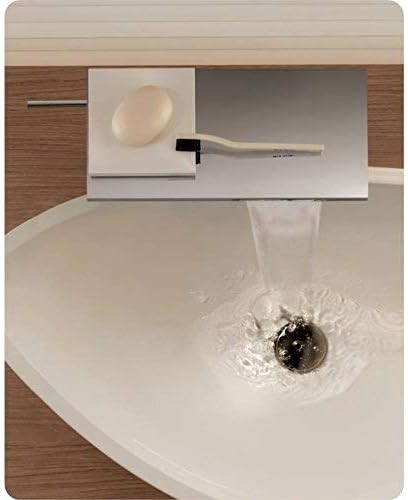 Top-down view of AXOR Massaud faucet with water flowing into a sink