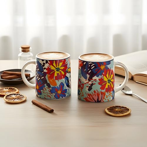 Image of Miah KaleidoBloom Ceramic Cup Set - Set of 2 | 10.16 cm x 6.85 cm x 8.89 cm | Handcrafted Coffee & Tea Mugs | Microwave & Dishwasher Safe | Vibrant Abstract Floral Design