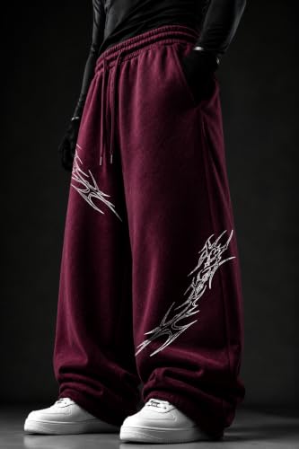 Image of Aesthetic Gothic Wide Leg Pants for Men | Tribal Print Baggy Streetwear | Oversized Track Pants with Elastic Waist | Black and White Relaxed Fit Bottoms