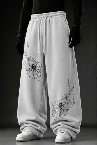 Image of Aesthetic Gothic Wide Leg Pants for Men | Tribal Print Baggy Streetwear | Oversized Track Pants with Elastic Waist | Black and White Relaxed Fit Bottoms