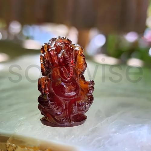 Image of SOULWISE Gomedh Ganesha Idol Hand Carved Hessonite Garnet Stone Decorative Figurine for Home Temple Spiritual Decor and Festive Gifting