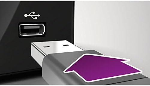 Close-up of a USB cable being inserted into the speaker's USB port