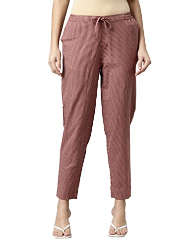 Image of GO COLORS Ikat Print Beige Printed Pencil Pant for Women | Breathable, Side Pocket