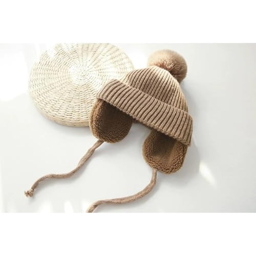 Gorro de punto para bebé con pompón grande y orejeras térmicas para el invierno 5