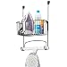 mDesign Metal Over Door Ironing Board Holder with Large Storage Basket - Holds Iron, Board, Spray Bottles, Starch, Fabric Refresher - for Laundry, Utility Room, Garage - Matte Black