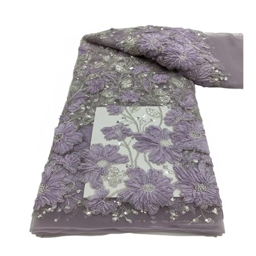 Tissu africain brodé de paillettes violettes pour célébrer vos racines