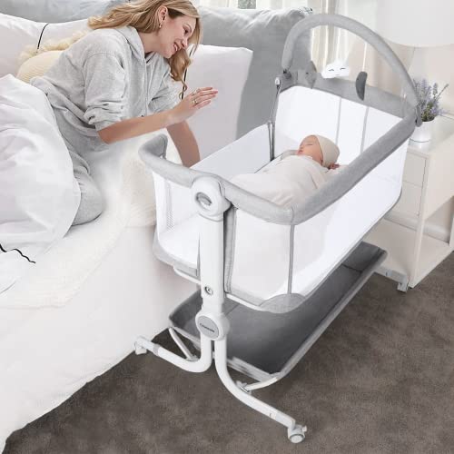 Cowiewie Baby Bassinet Bedside Sleeper with Storage Basket,Wheels, Easy Folding Portable Bassinet...