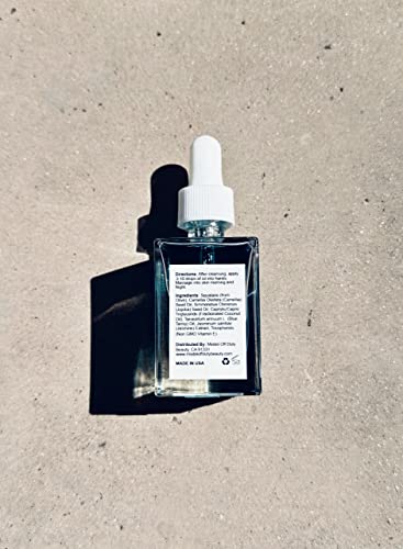 Model Off Duty Beauty Supreme Even Skin Blue Tansy Face Oil | Made With Natural & Vegan Ingredients | Brightening Serum Anti Aging Collagen Support Acne Fighting Dark Spot Corrector Facial Moisturizer #TOP4