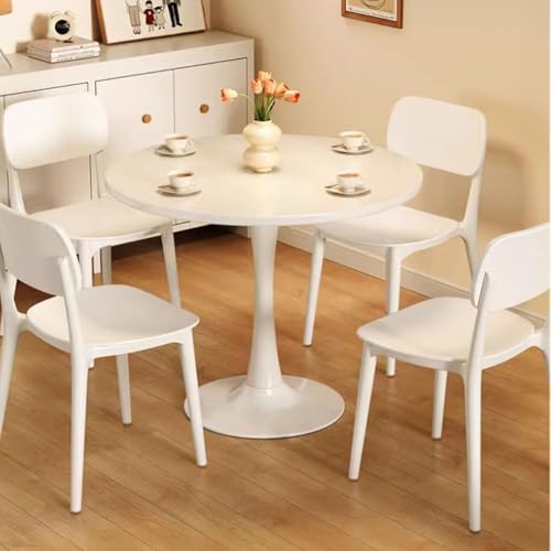 Table de salle à manger ronde tulipe pour optimiser l'espace de votre studio