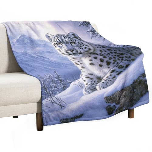 Couverture léopard dans la neige pour des soirées cocooning canapé - 2