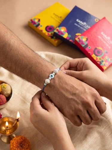 Image of Karatcart Rakhi for Brother Gold-Plated Kundan Rakhi Set of 3 with Roli Chawal