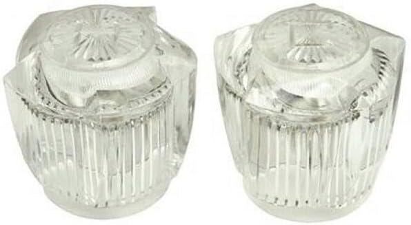 Pair of clear acrylic faucet handles, slightly angled view