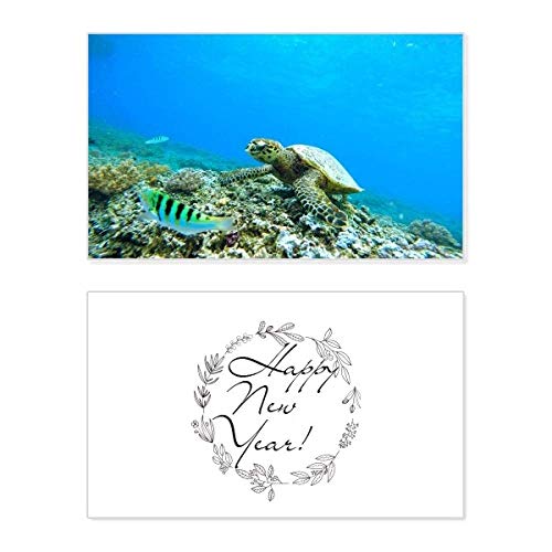 Tarjeta de año nuevo de tortuga marina y peces ideal para mensajes de bendición y amantes del mar