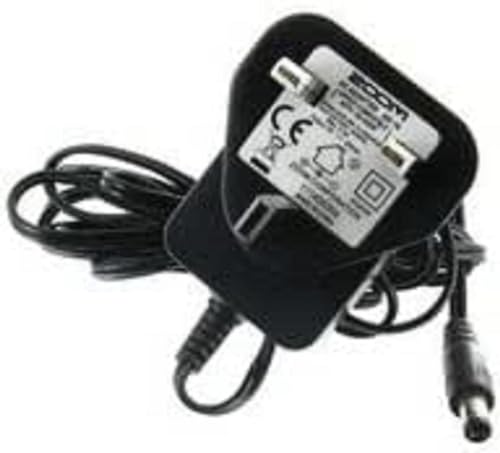 Alimentador Zoom AD-16 de 9V soluciona ruidos en pedales polo negativo centro