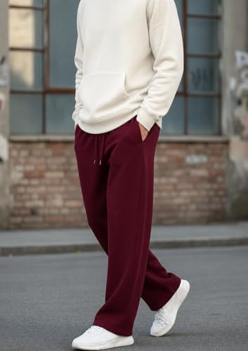 Image of Aesthetic Gothic Wide Leg Pants for Men | Tribal Print Baggy Streetwear | Oversized Track Pants with Elastic Waist | Black and White Relaxed Fit Bottoms