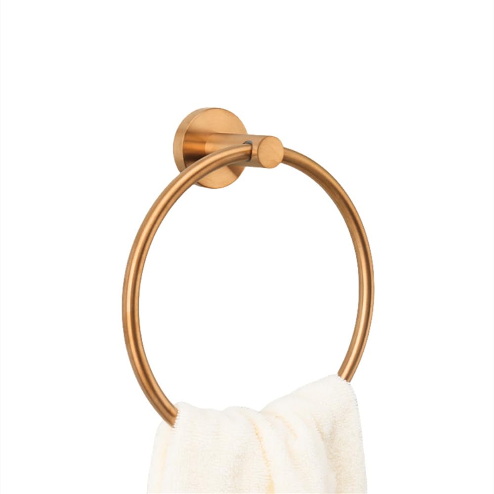 Accessoires de salle de bain en or rose brossé incluant brosse de toilette et porte-serviettes