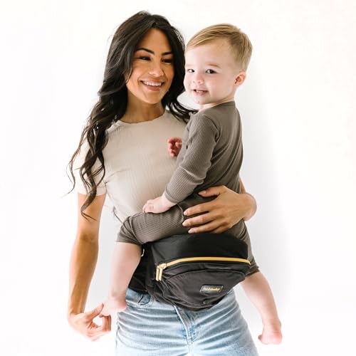 Image of Tushbaby - Safety-Certified Hip Seat Baby Carrier - Mom’s Choice Award Winner, Seen on Shark Tank, Ergonomic Carrier & Extenders for Newborns & Toddlers (Carrier, Black/Gold)