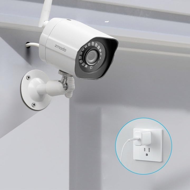 Zmodo outdoor security camera connected to a power outlet.