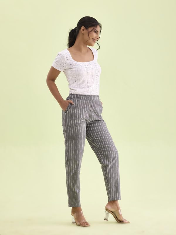Image of GO COLORS Ikat Print Beige Printed Pencil Pant for Women | Breathable, Side Pocket