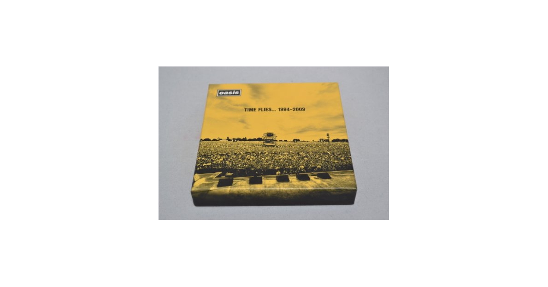 Oasis「Time Flies... 1994-2009」 オアシス - Time Flies 1994-2009 - Amazon.com Music