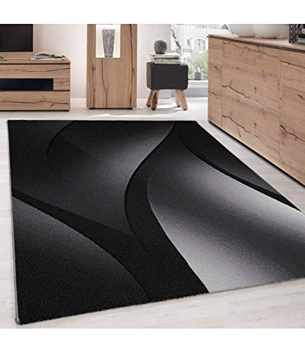Tapis à poils courts moderne et facile à entretenir au motif de vagues abstraites