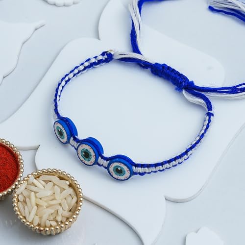 Image of eCraftIndia White Blue Evil Eye Rakhi Set of 2 | Rakhi for Brother Bhaiya Bhai with Best Bro Ever Fridge Magnet | Roli Chawal Pack