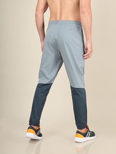Image of TECHNOSPORT Mens Woven Regular Fit Activewear Joggers for Running, Gym, Sports and Regular Use Stretchable, Colorblock and Antimicrobial