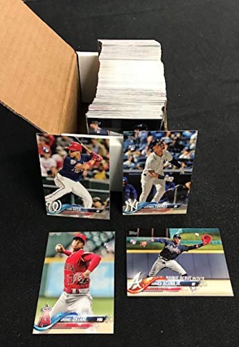 2018 Topps Update Complete Baseball Set of 300 Cards Includes Rookies and Traded Cards. Overall Condition is NM-MT. Includes rookie cards of Ohtani (3 Total Cards), Gleyber Torres (3 Total Cards), Acuna Jr. (3 Total Cards), and updated cards of Gianc