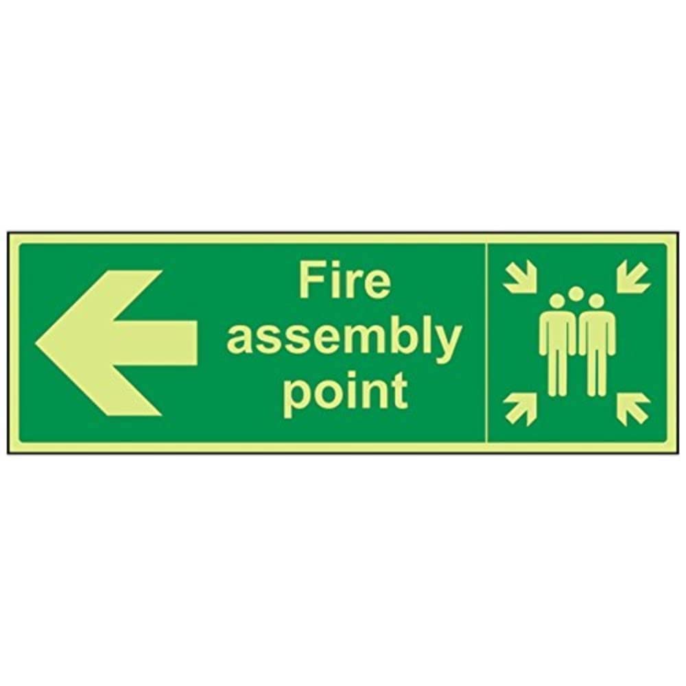VSafety 17021BJ-G "Fire Assembly Point Arrow Left" Sign, Glow In Dark, 1 mm Plastic, Landscape, 450 mm x 150 mm, Green