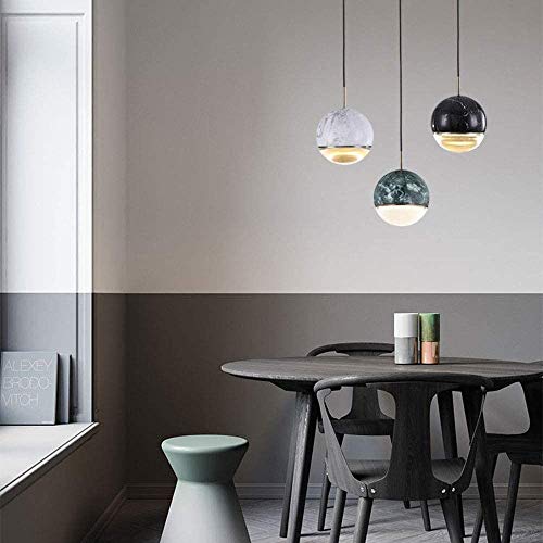 Mesa de comedor creativa iluminada con lámparas de araña posmodernas 4
