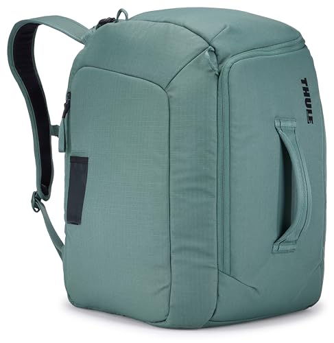 Thule RoundTrip 45L Boot Backpack - Storage compartments to organize and protect gear - Boot bag for ski and snowboard travel - Soft pocket for goggles and helmet - Built in standing pad