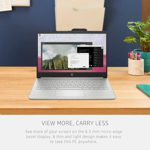 Image of HP 14 inch HD Laptop | Back to School Limited Edition with 1 Year Microsoft 365 | Intel Quad-Core Processor | Long Battery Life | w /WOWPC Bundle | Windows 11 (Natural Silver, 32GB RAM | 576GB Storage)
