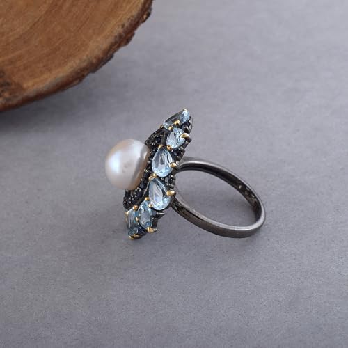Bague topaze bleue et saphir réglable pour sublimer vos tenues de soirée chic