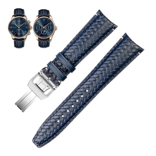 Bracelet de montre cuir véritable bleu au poignet d'un homme en costume d'affaires