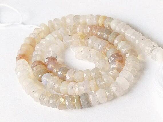 Perle opal de feu éthiopienne 5.5mm, le fil idéal pour un cadeau unique