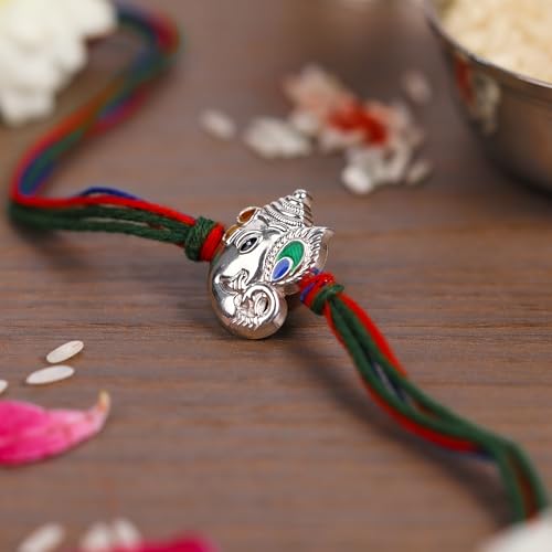 Image of Milan Jewellers MorPankh Ganesh ji 99.5 Pure Silver rakhi for brother