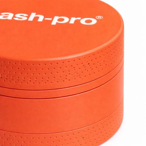 Image of Stash-Pro Small Neon Crusher (Orange) | Compact Mini Metal Crusher /Grinder | 38mm Diameter x 23mm Height | Textured Grip | Pocket Size | Easy Twist Design