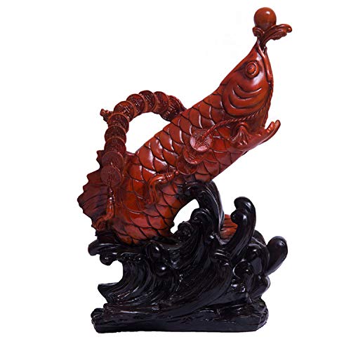 Petite statue de poisson rouge pour égayer le tableau de bord